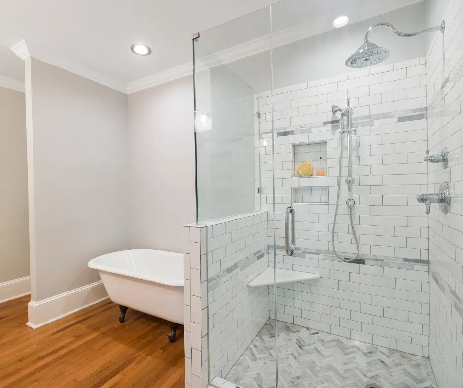 Clear glass shower enclosure in a bright bathroom